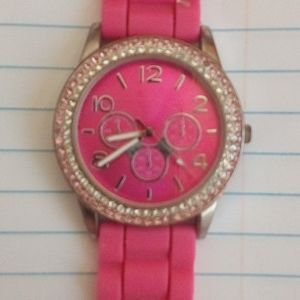 Watch, hot pink with bling around the rim